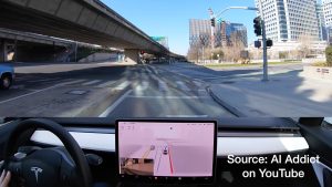 FSD is not ready: Tesla Model 3 rolls through red light on right turn, hits pylon, and attempts to enter tram-lane