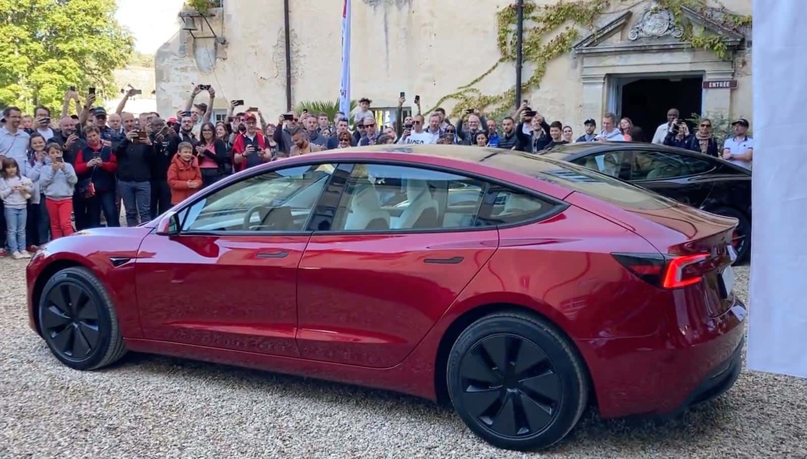 The Tesla Model 3 Highland, Just Made A Striking Debut In The Heart Of France. At A Recent Tesla Owners Club Event At The Chateau De Savigny-Les-Beaune